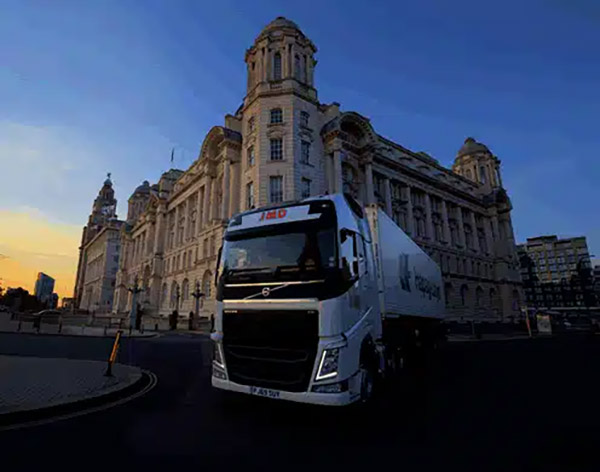 Photo of JMD lorry on road